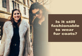 Modern women in a fur coat walking in the city, representing the question: is it still fashionable to wear fur coats today?