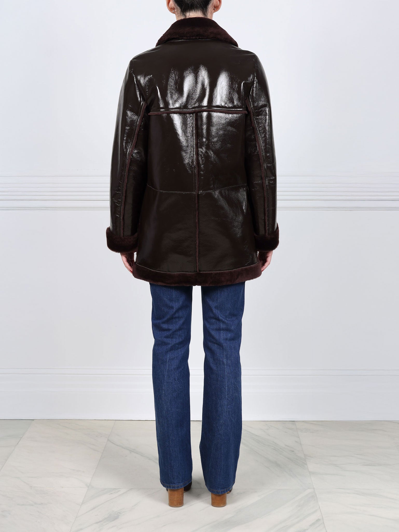 The Vermilion Patent Shearling Coat