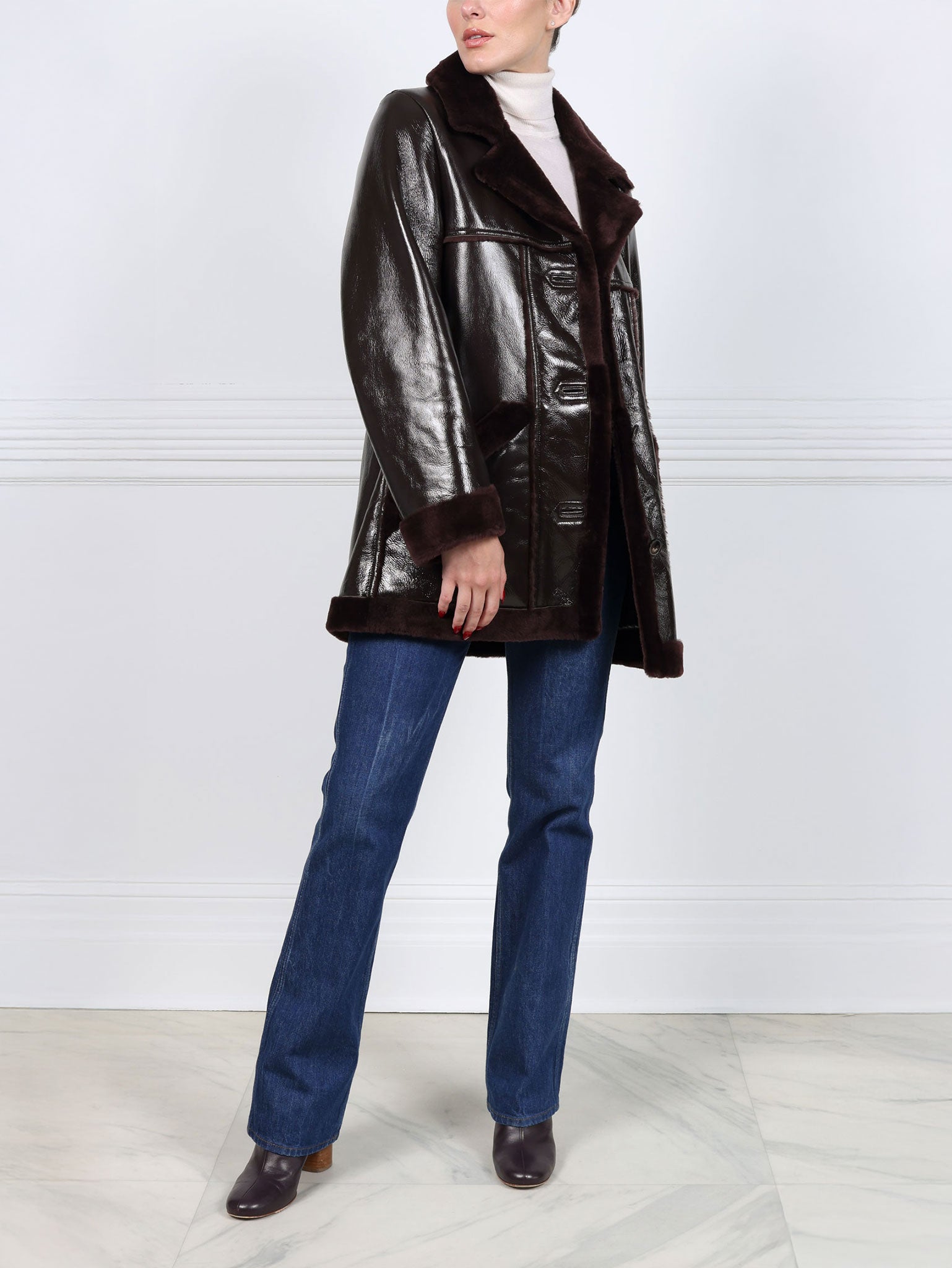 The Vermilion Patent Shearling Coat