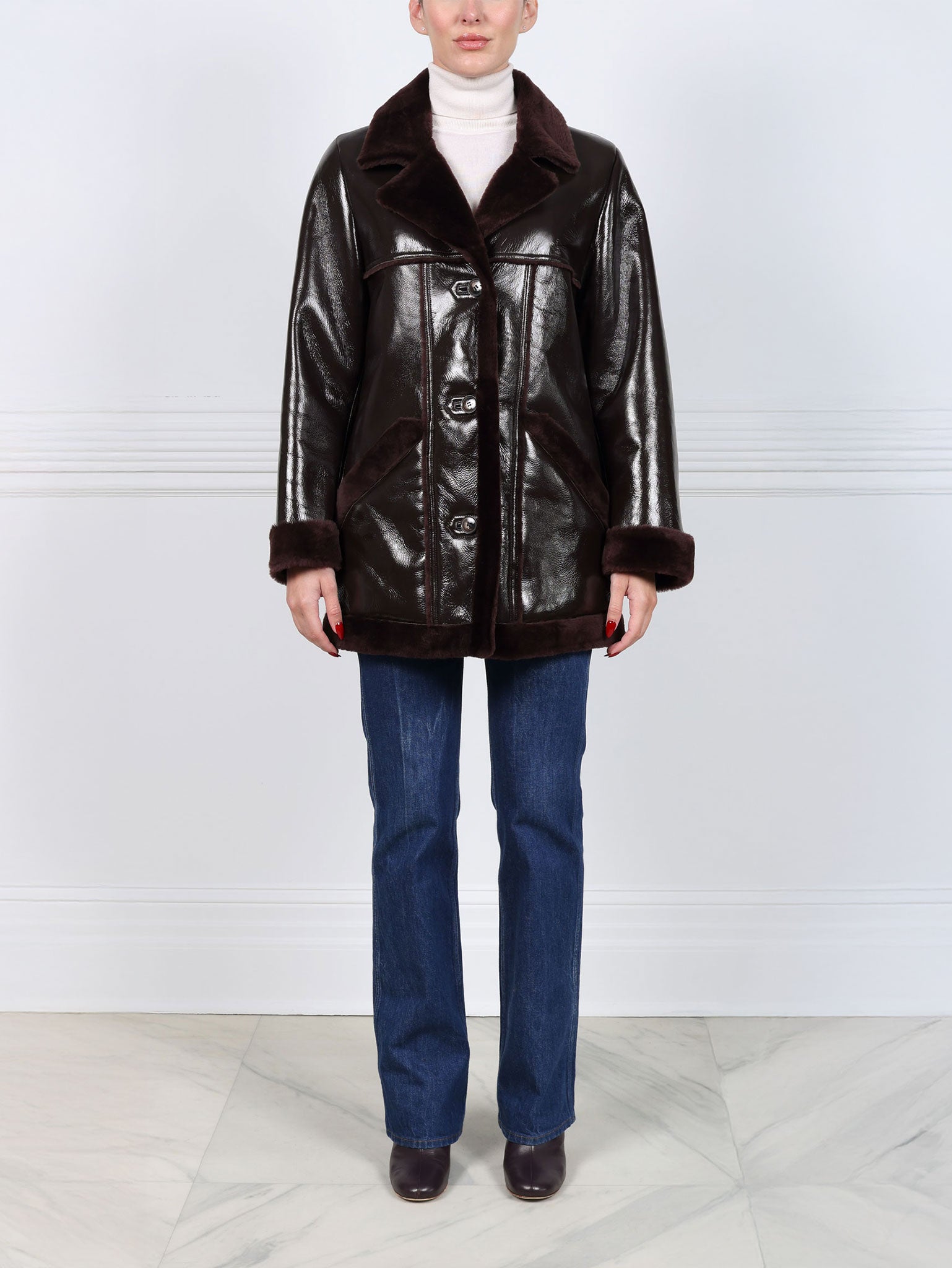 The Vermilion Patent Shearling Coat