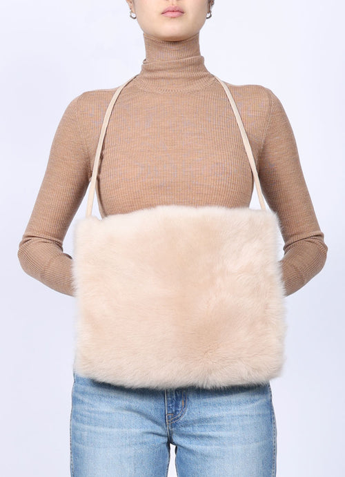 The Cozy Cashmere Shearling Muff Bag