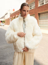 The Minnie Shearling Bomber Jacket in Ivory
