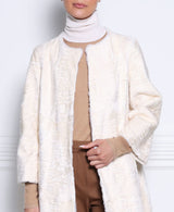 The Linden Swakara Lamb Coat in White