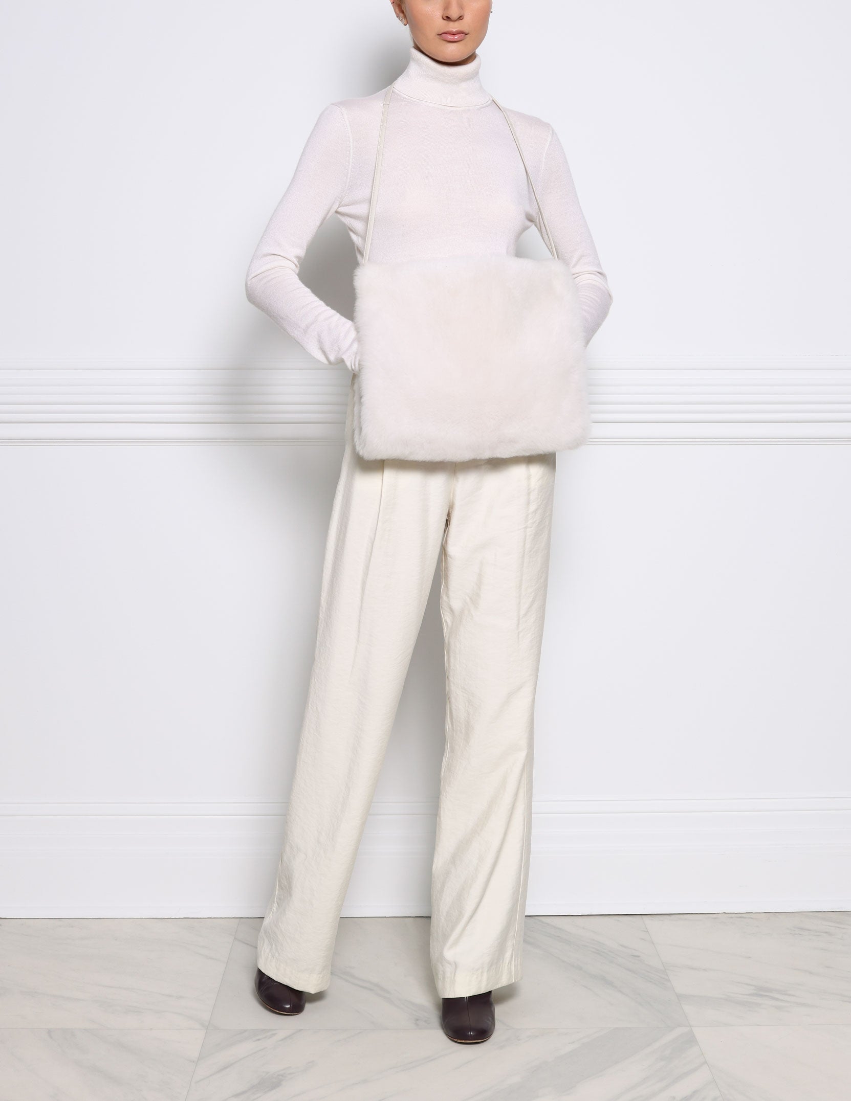 The Cozy Cashmere Shearling Muff Bag