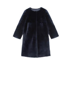 The Tempest Reversible Shearling Coat