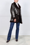 The Vermilion Patent Shearling Coat