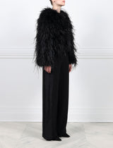 SIDE VIEW-BLACK OSTRICH FEATHER JACKET-CREW NECK-FULL LENGTH STRAIGHT SLEEVES-SLIT POCKETS-HOOK AND EYE CLOSURES-20 INCH CENTER BACK LENGTH-BY POLOGEORGIS