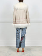 BACK VIEW-DASH WIGGLE PRINTED SHEARLING JACKET REVERSIBLE TO LONG CURLY SHEARLING FUR DESIGNED BY ZANDRA RHODES FOR POLOGEORGIS-LONG CURLY SHEARLING FUR SHAWL COLLAR-FULL LENGTH FUR TRIMMED SLEEVES- SLIT POCKETS-SNAP CLOSURES-27 INCH CENTER BACK LENGTH-TAUPE LEATHER  REVERSIBLE TO IVORY FUR