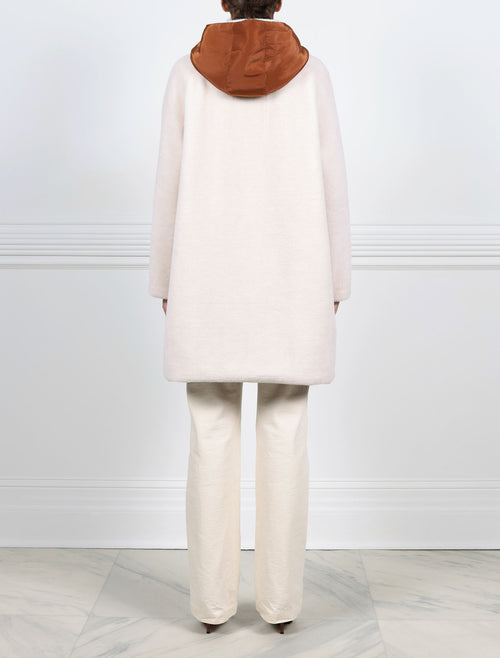 BACK VIEW SHEARLING SIDE-IVORY SHEARLING ANORAK REVERSIBLE TO CONTRASTING COCO TECHNO FABRIC-HOODED-FULL LENGTH SLEEVES-FLAP POCKETS-HIDDEN FRONT SNAPS OVER ZIPPER CLOSURE-31 INCH CENTER BACK LENGTH-BY POLOGEORGIS