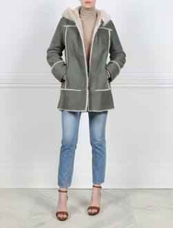 ACTION VIEW-LAUREL GREEN HOODED SHEARLING COAT-STRAIGHT FULL LENGTH SLEEVES-SLIT POCKETS-SNAP CLOSURES-FUR OUT SEAMS-32 INCH CENTER BACK LENGTH-BY POLOGEORGIS