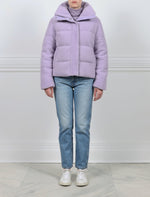 FRONT VIEW-LAVENDER DYED SHEARLING PUFFER JACKET-STAND COLLAR-FULL LENGTH SLEEVES-HIDDEN FRONT ZIP CLOSURE WITH SNAPS-SLIT POCKETS-26 INCH CENTER BACK LENGTH-BY POLOGEORGIS