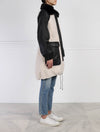Leather and Shearling Coat in Black and White