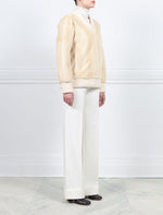 PALOMINO MINK V-NECK PULLOVER WITH KNIT TRIM AT NECKLINE,WRISTS AND WAIST-27 INCH CENTER BACK LENGTH-BY POLOGEORGIS