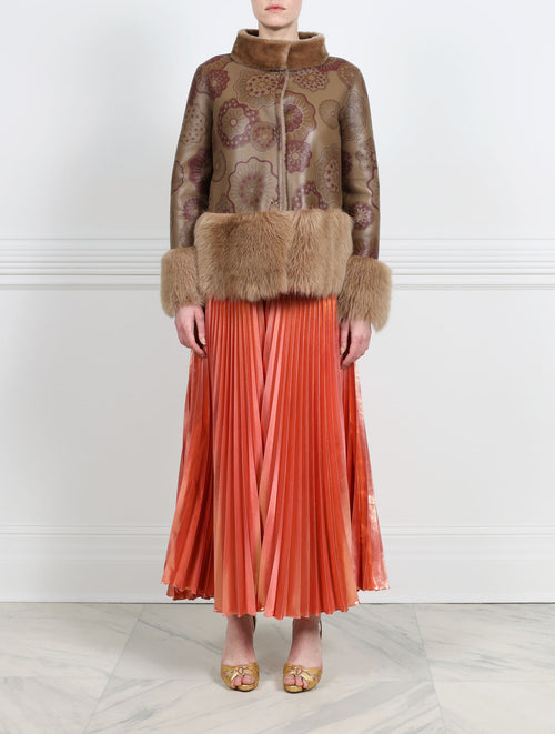 FRONT VIEW-PRINTED SHEARLING JACKET WITH FUR PEPLUM AND CUFFS DESIGNED BY ZANDRA RHODES FOR POLOGEORGIS- FUR STAND COLLAR-STRAIGHT SLEEVES WITH FUR SLEEVE ENDS-SNAP CLOSURES-24 INCH CENTER BACK LENGTH- PRINTED FANTASTIC FLOWERS DESIGN ON BROWN SHEARLING